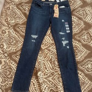 Women's Distressed Blue Jeans